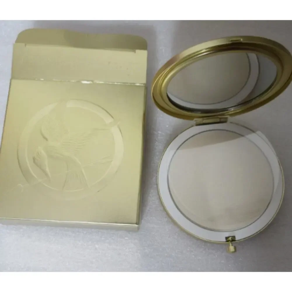 NIB Storybook Cos Girl On Fire Hunger Games Pressed Powder